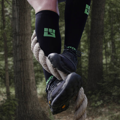 Tall compression running socks by MudGear - Black/Green
